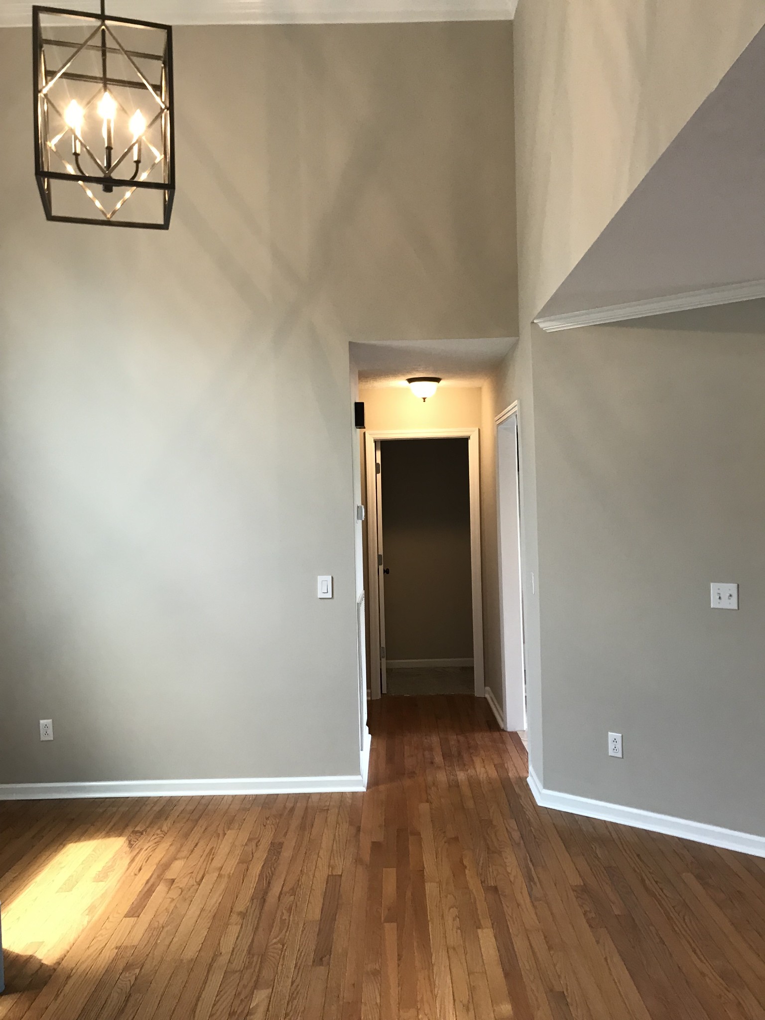 307 Clearview Drive Springfield, TN 37172 - Photo 22 of 33 an empty room with wooden floor and windows