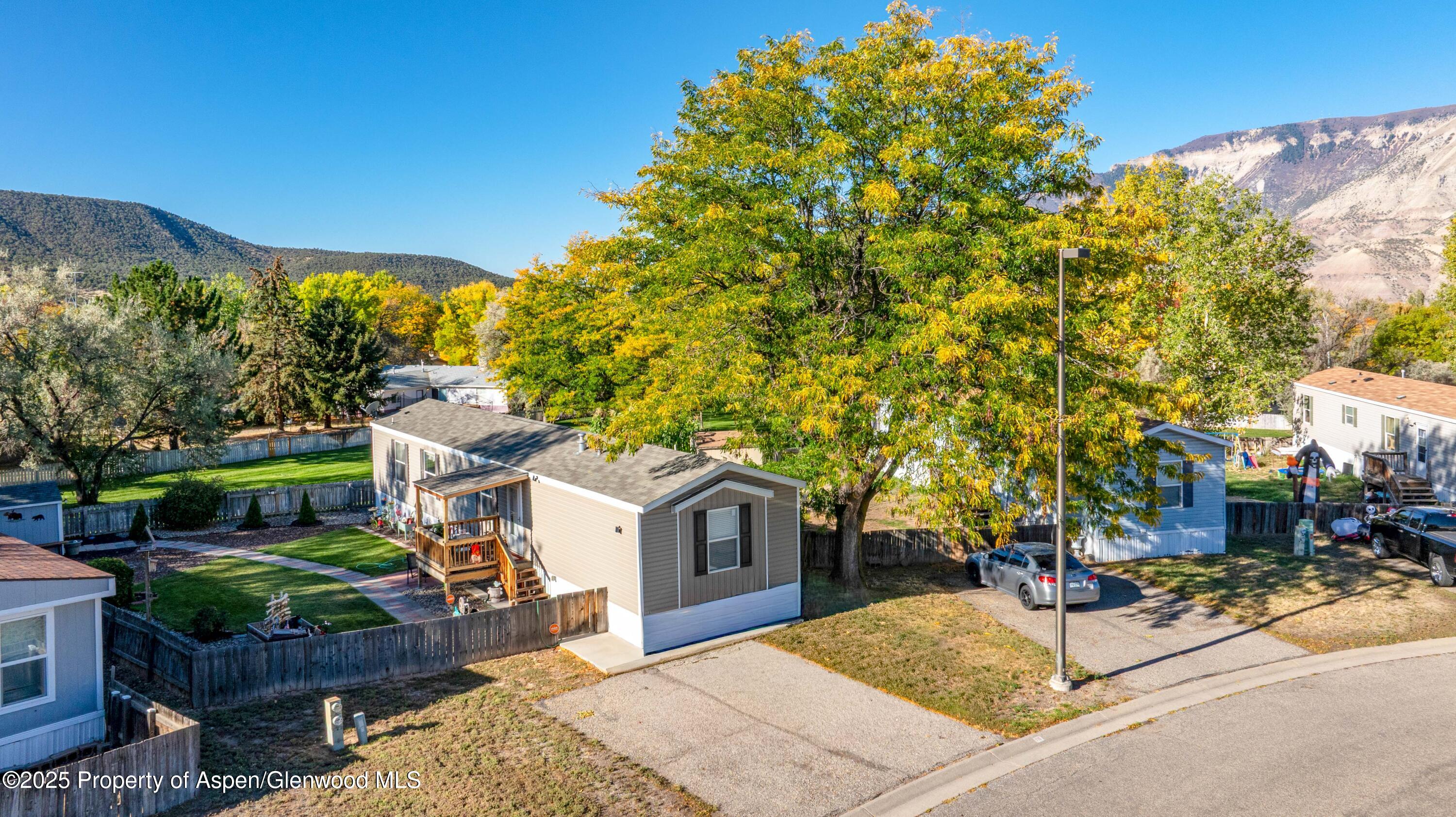 116 Iron Wedge Circle Parachute, CO 81635 - Photo 2 of 20 a view of a house with a patio