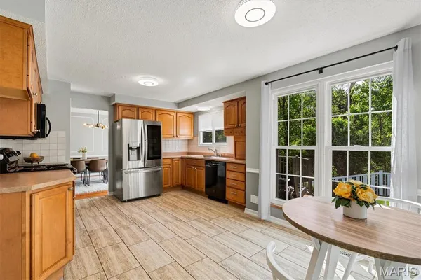 $419,900 | 1912 Springtree Drive, Maryland Heights, MO 63043