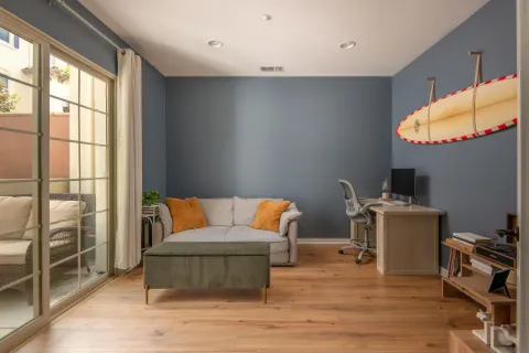 a living room with a couch and a stove