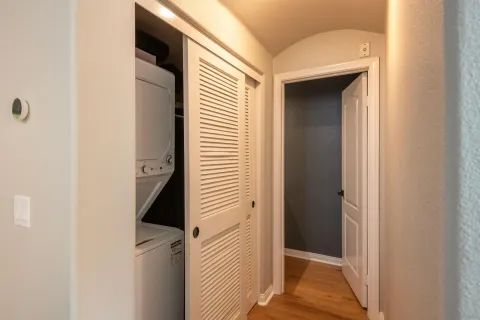 a view of a bedroom from a hallway