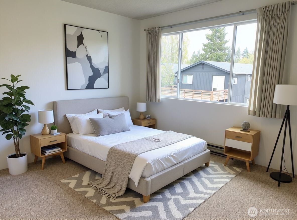 8848 Interlake Avenue North Seattle, WA 98103 - Photo 13 of 25 a bedroom with bed and a window