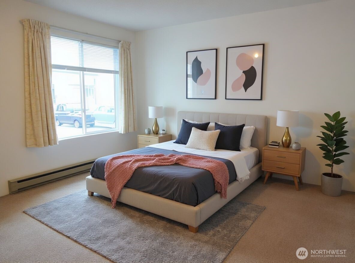 8848 Interlake Avenue North Seattle, WA 98103 - Photo 15 of 25 a spacious bedroom with a bed and window