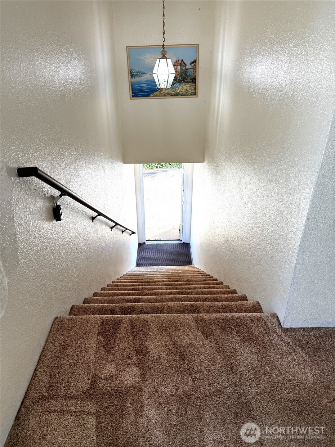 8848 Interlake Avenue North Seattle, WA 98103 - Photo 23 of 25 a bedroom with a bed and a window