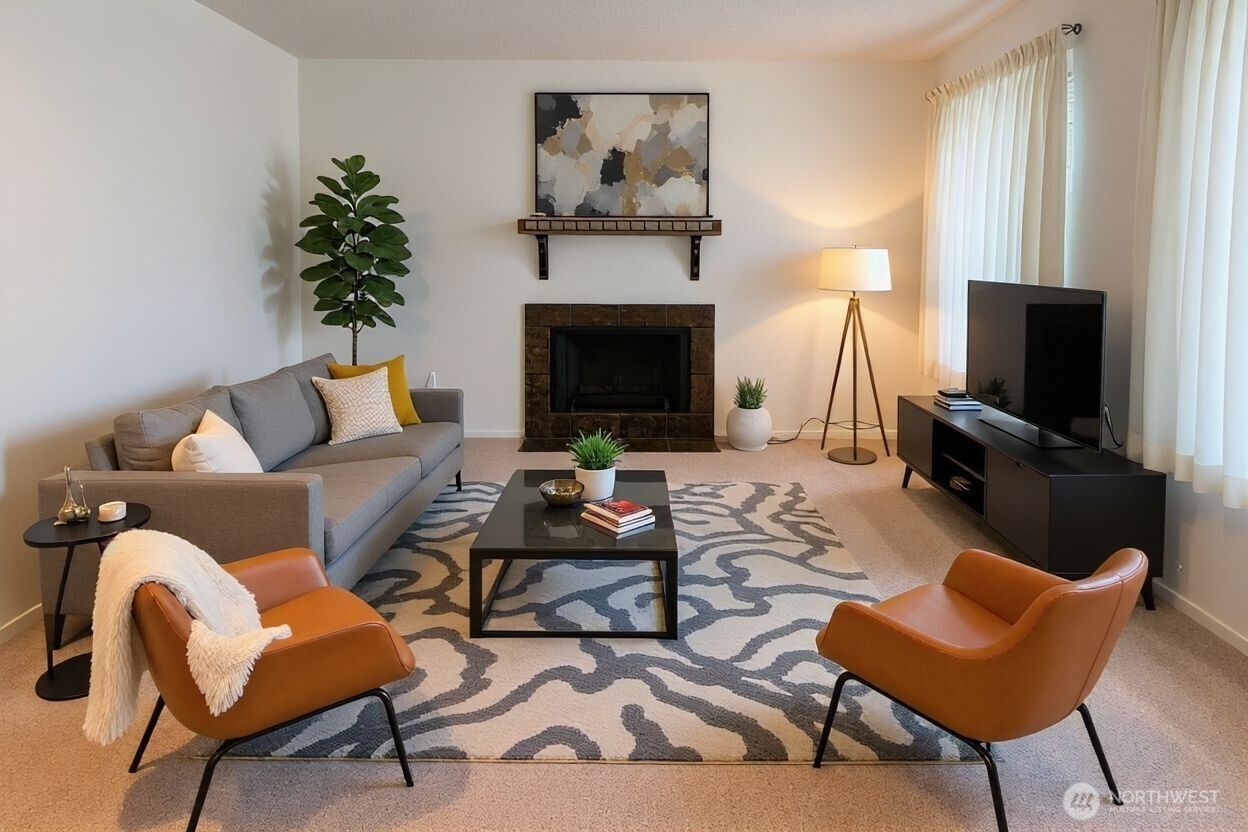 8848 Interlake Avenue North Seattle, WA 98103 - Photo 6 of 25 a living room with furniture and a fireplace