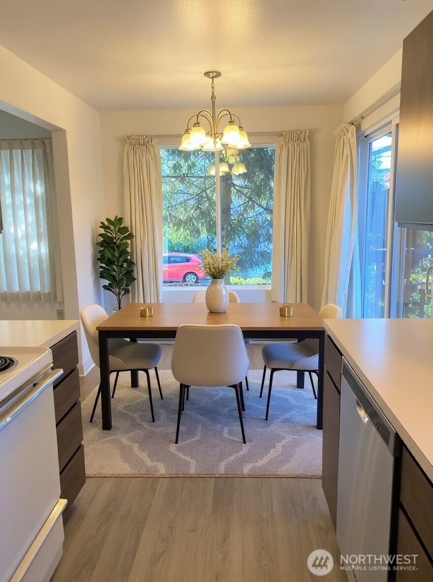 8848 Interlake Avenue North Seattle, WA 98103 - Photo 7 of 25 a dining room with furniture and window