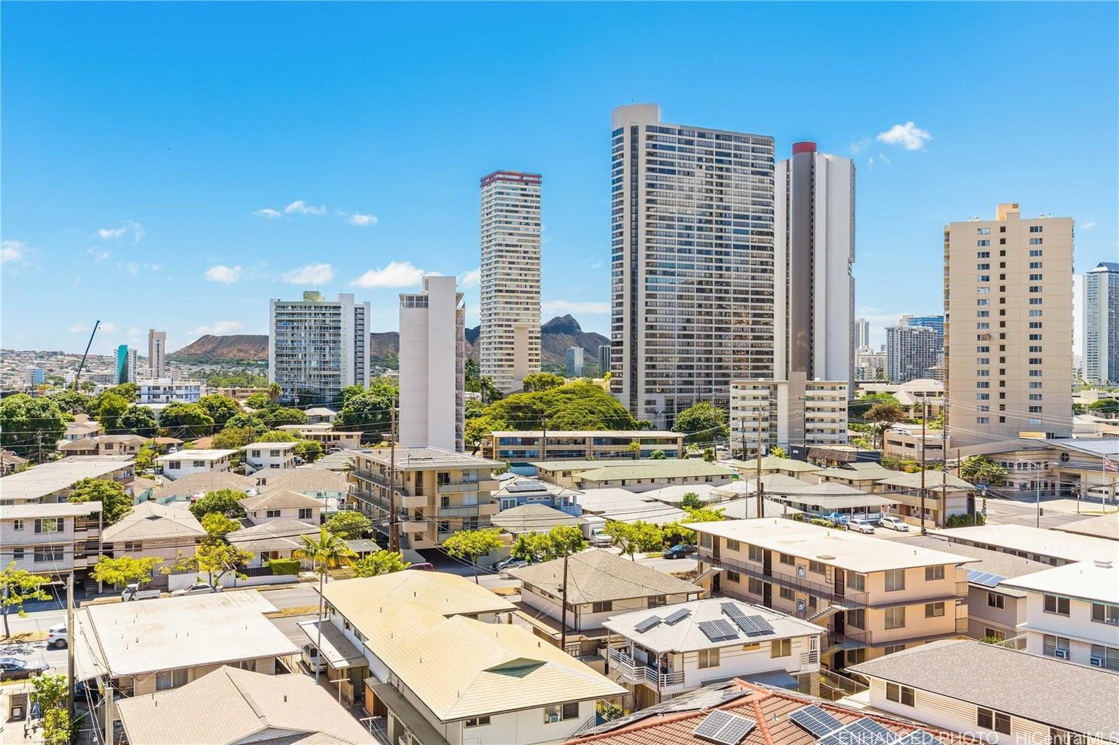 739 Hausten Street, Unit 901 Honolulu, HI 96826 - Photo 18 of 24 a city view with tall buildings