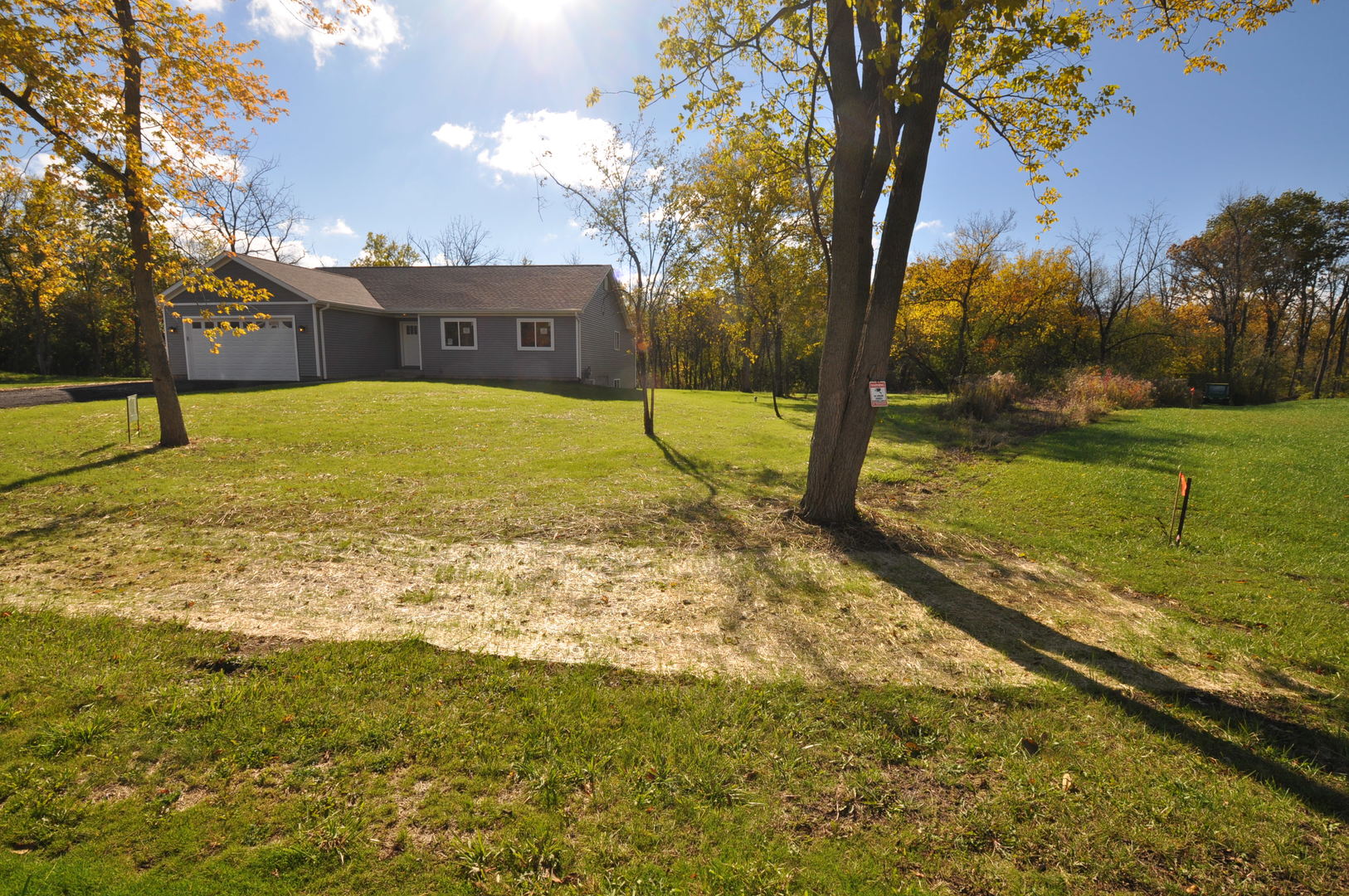 26369 Park Place Antioch, IL 60002 - Photo 4 of 24 a view of a pool with a yard