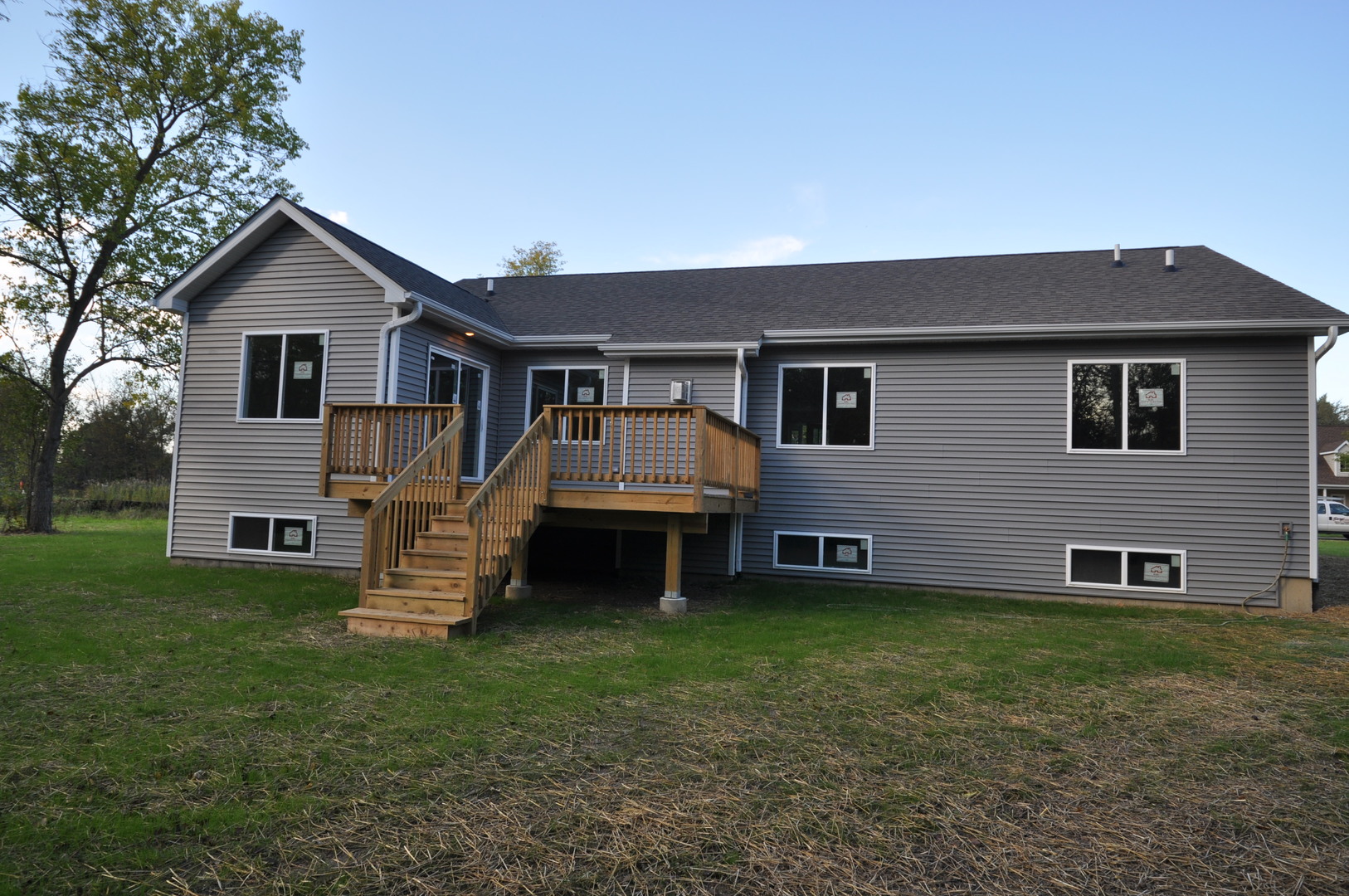 26369 Park Place Antioch, IL 60002 - Photo 5 of 24 a front view of a house with a yard