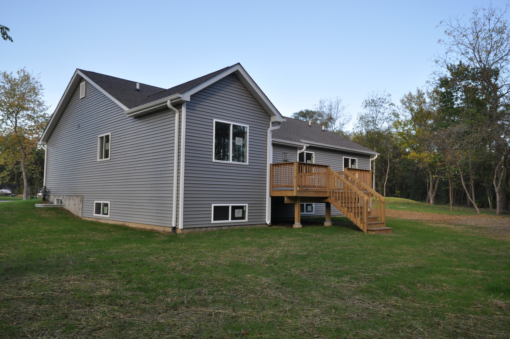 26369 Park Place Antioch, IL 60002 - Photo 6 of 24 a front view of house with a garden and deck