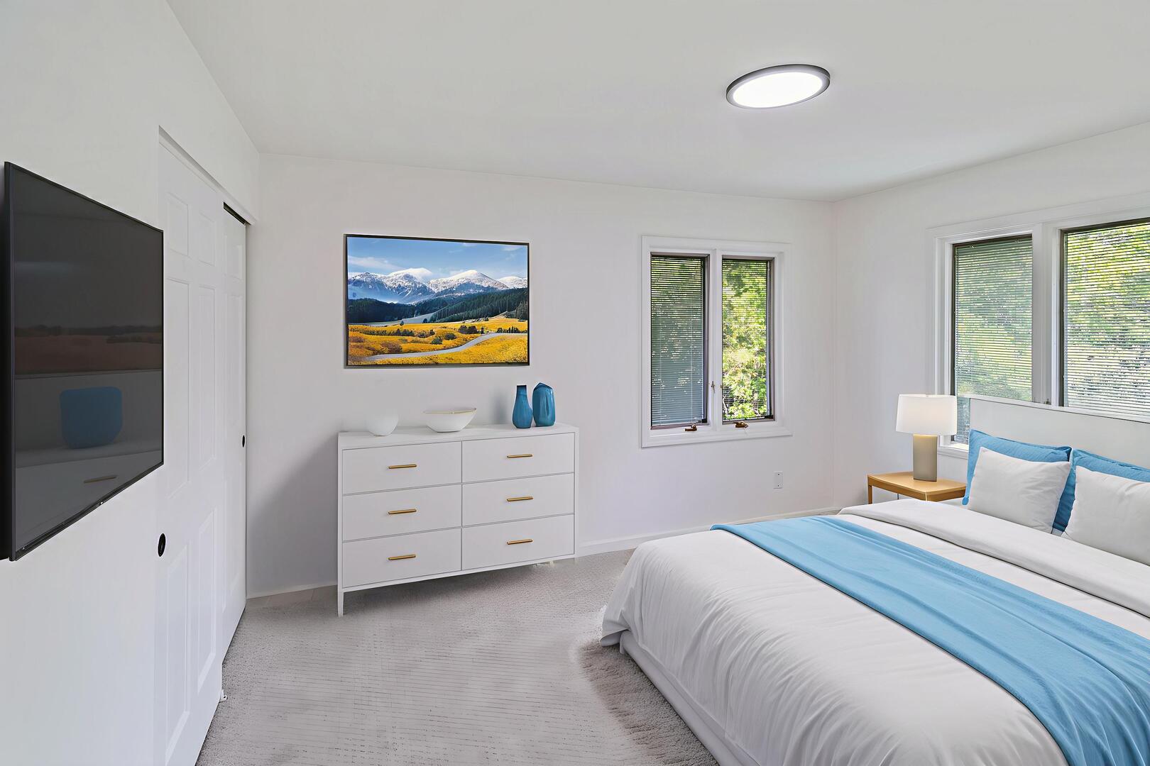 185 Cold Spring Road Barrington, IL 60010 - Photo 24 of 40 a bedroom with a bed and a flat screen tv