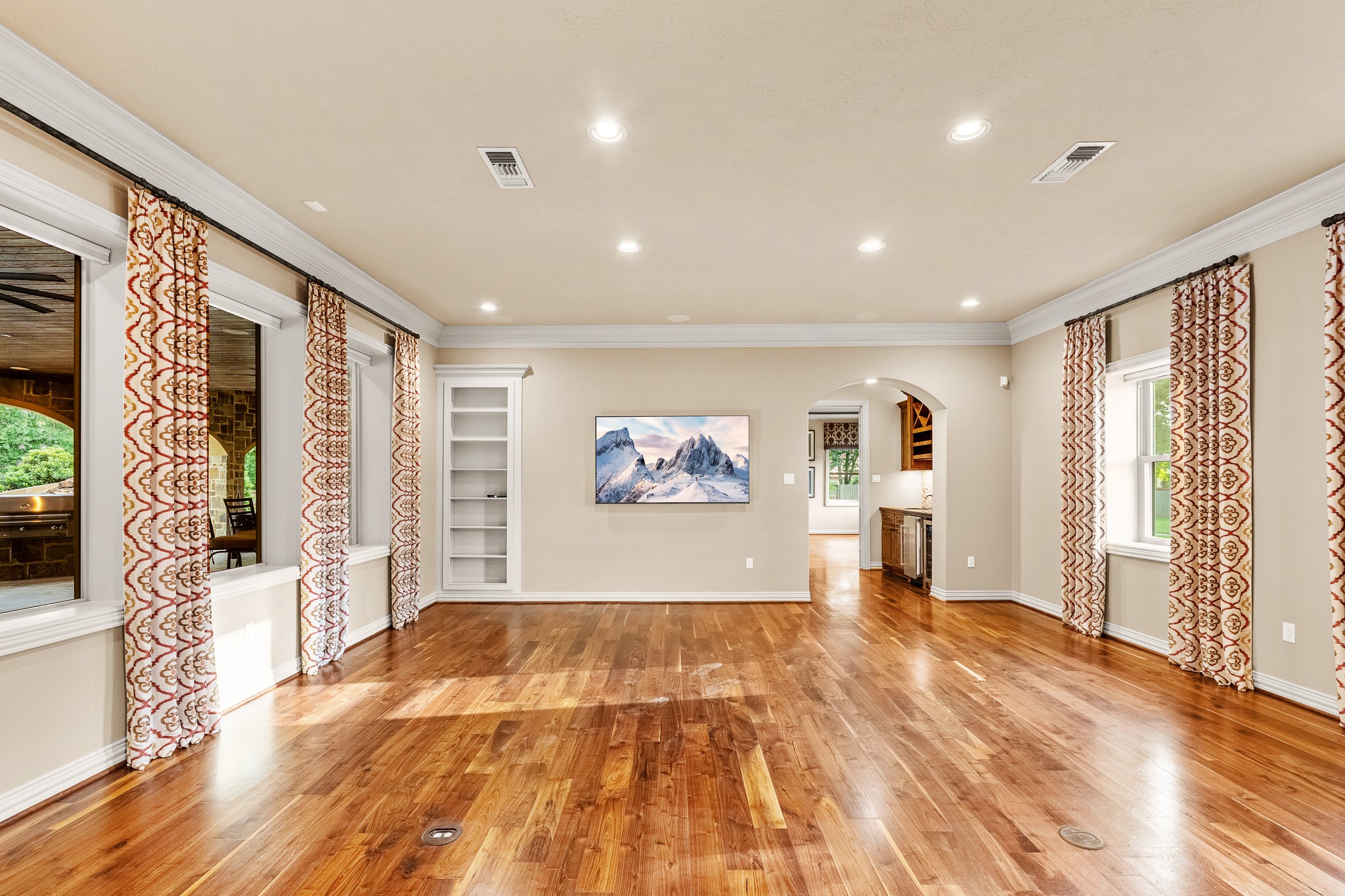 28002 Whispering Maple Way Spring, TX 77386 - Photo 22 of 44 a view of livingroom with hardwood floor and hallway