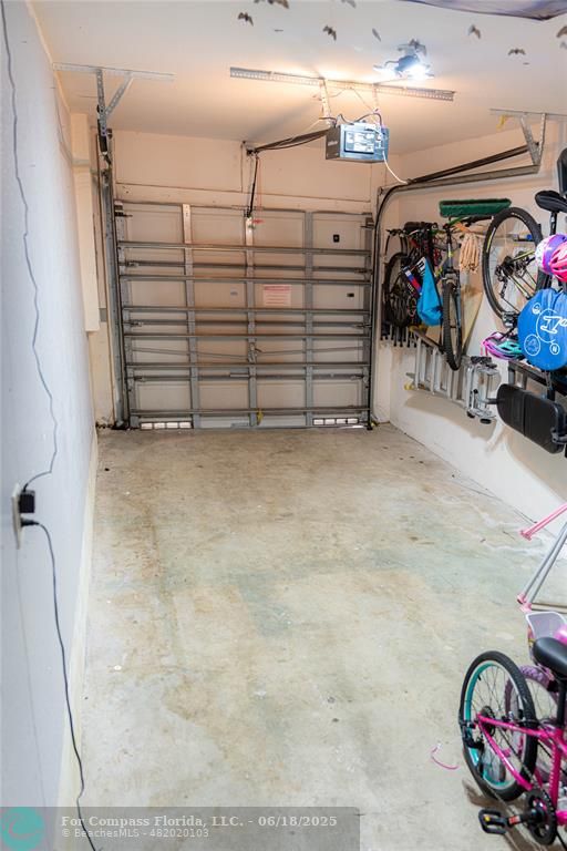 1102 Southwest 158th Avenue Pembroke Pines, FL 33027 - Photo 22 of 27 a view of a garage with storage