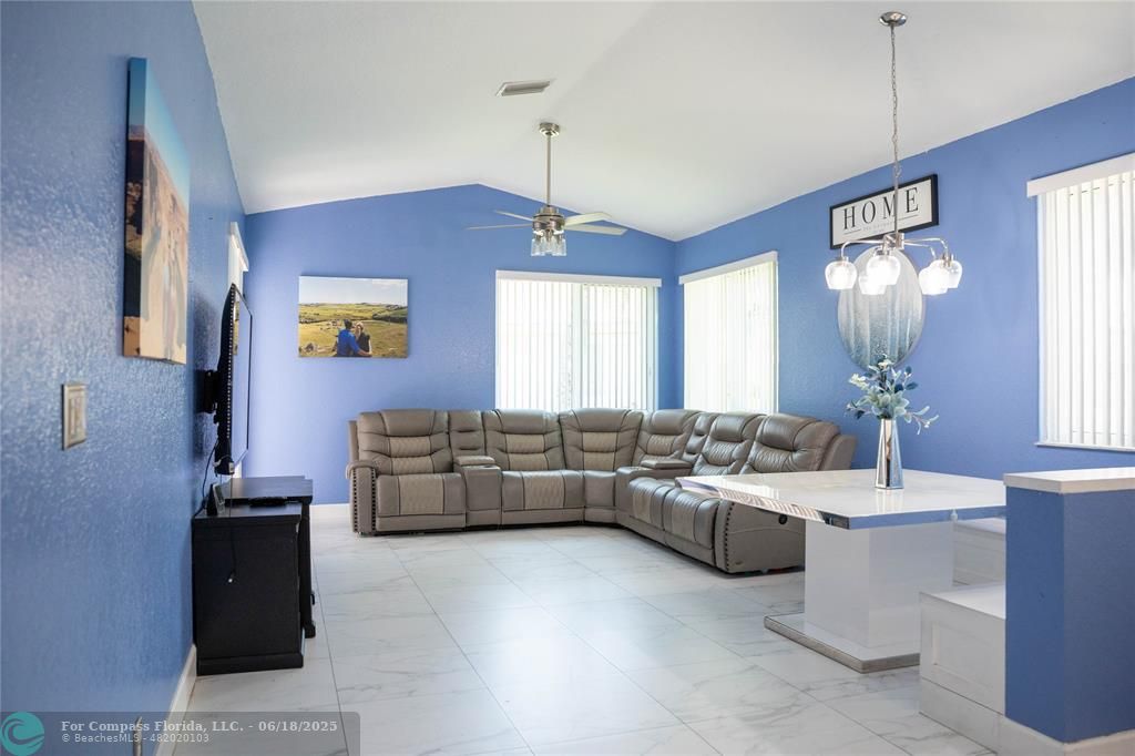 1102 Southwest 158th Avenue Pembroke Pines, FL 33027 - Photo 4 of 27 a living room with furniture and window