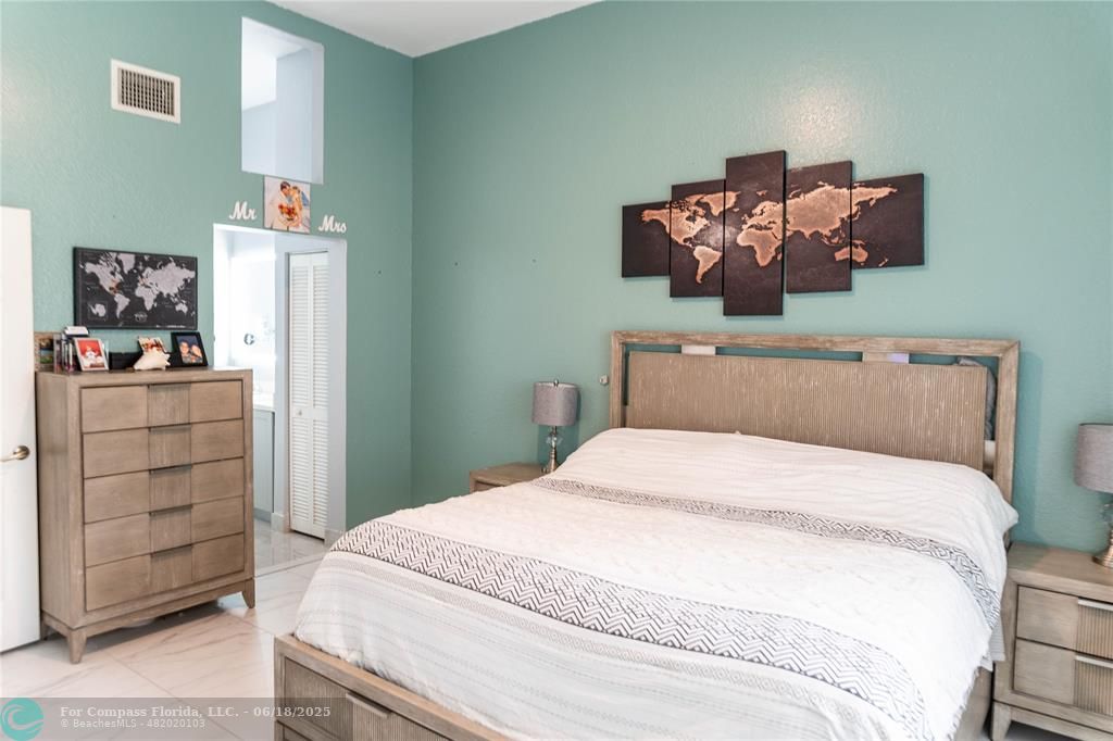 1102 Southwest 158th Avenue Pembroke Pines, FL 33027 - Photo 10 of 27 a bedroom with a bed and dresser