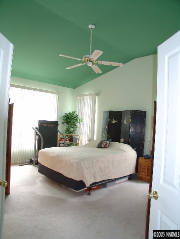 220 Falling Water Court Reno, NV 89519 - Photo 8 of 9 a bedroom with a bed window and dresser