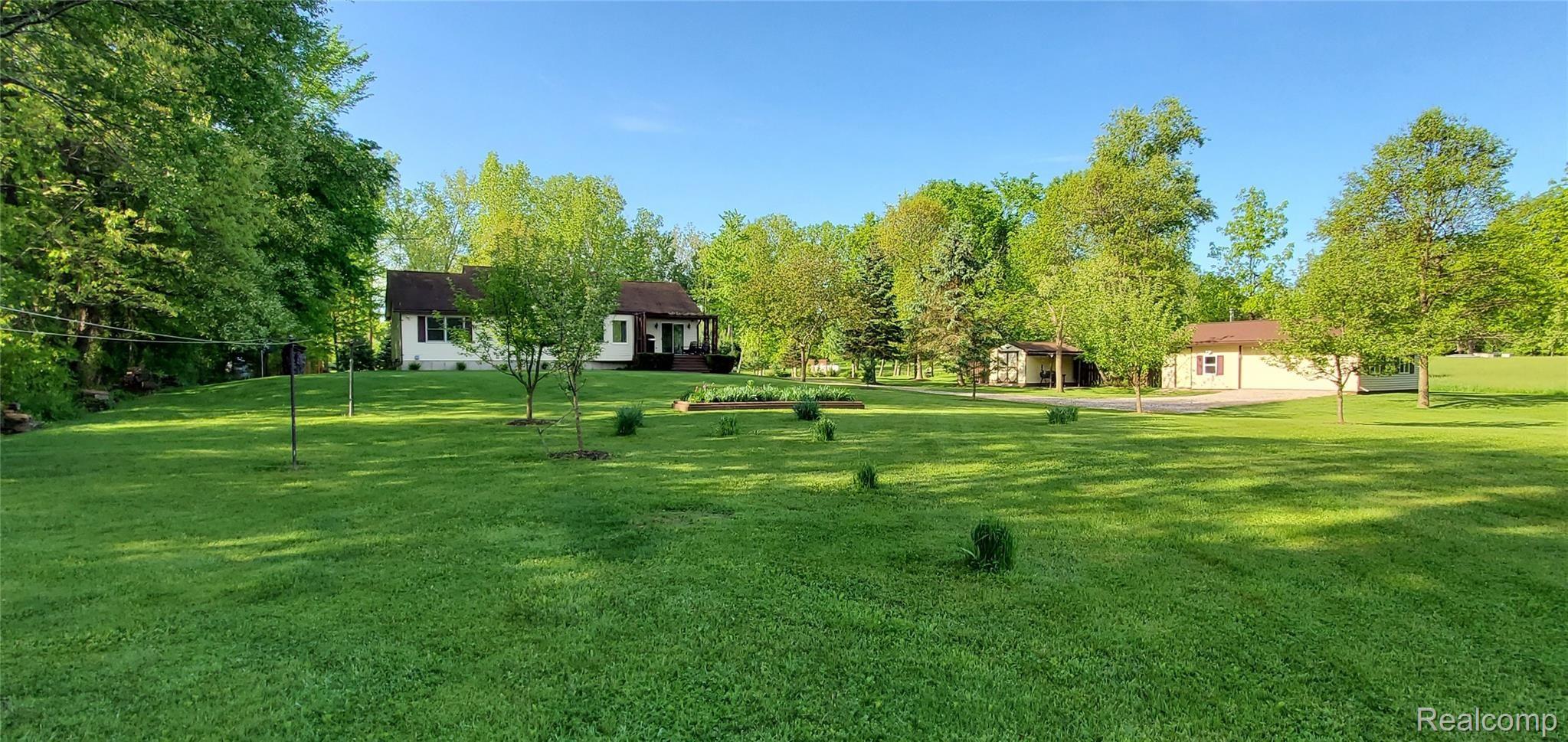 5520 Lowe Road Fowlerville, MI 48836 - Photo 19 of 86 5520 West Lowe Rd View from backyard