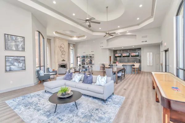 a living room with furniture and a table