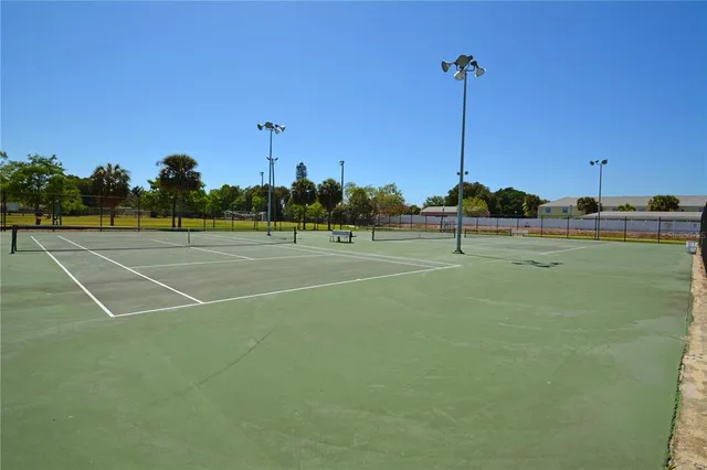 an aerial view of a house with a lake view