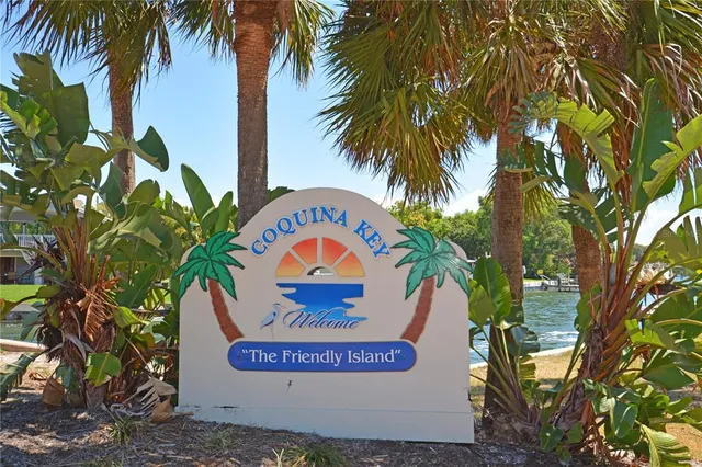 an aerial view of a house with a lake view