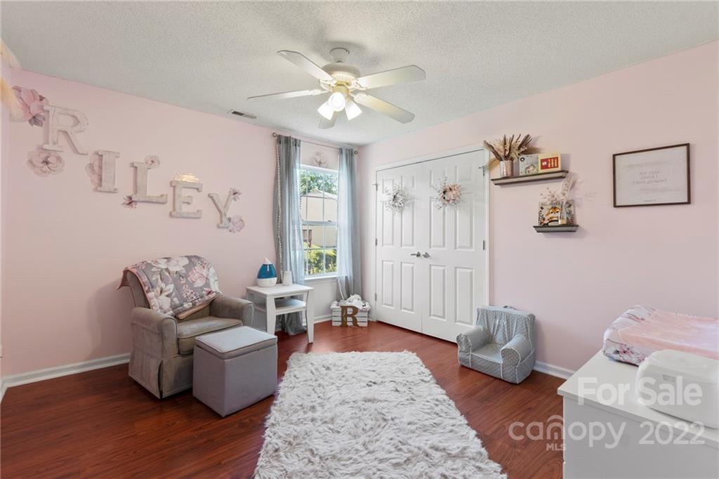 420 Wrayhill Drive Charlotte, NC 28262 - Photo 19 of 22 a living room with furniture and wooden floor