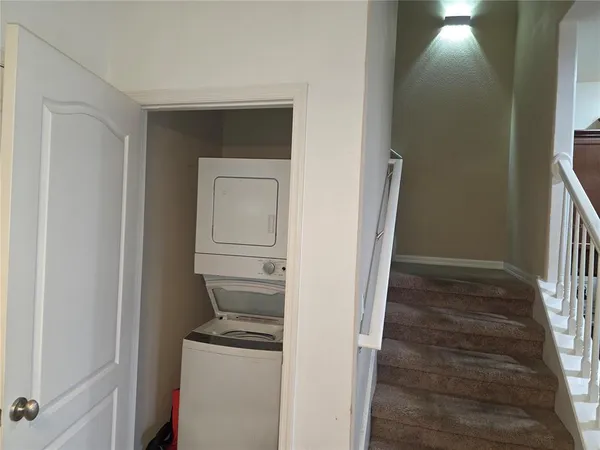 a room with a washer and dryer