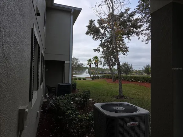 a view of backyard with green space