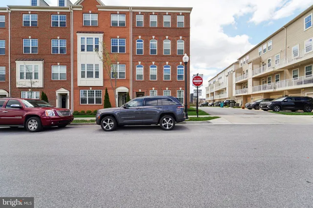 a view of a cars parked in front of a building