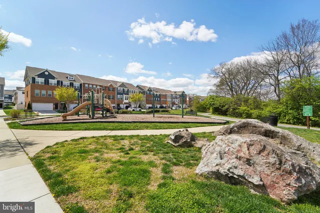 a view of a swimming pool with a yard