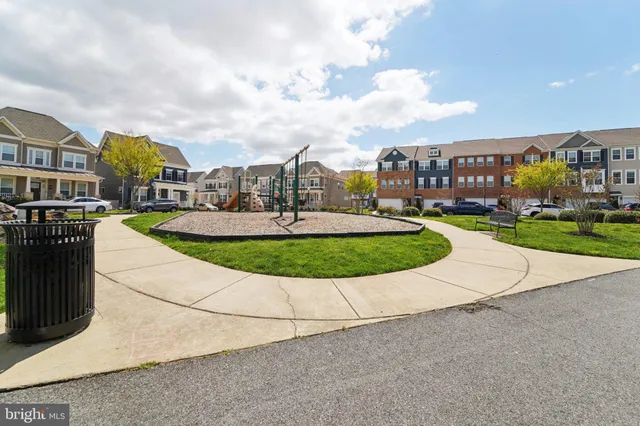 a view of a water fountain in front of the house