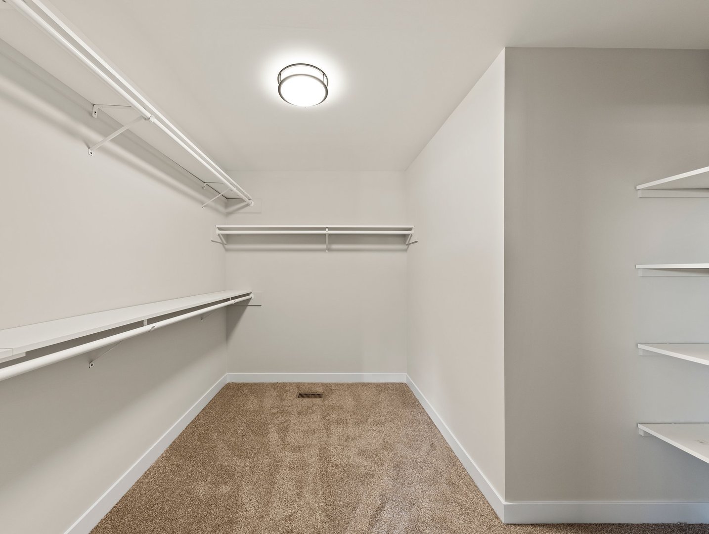 1927 Parkside Drive Sycamore, IL 60178 - Photo 8 of 17 a view of an empty walk in closet