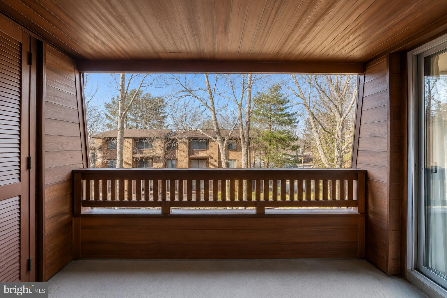 5239 West Running Brook Road, Unit 302 Columbia, MD 21044 - Photo 4 of 8 Serene balcony with natural views.