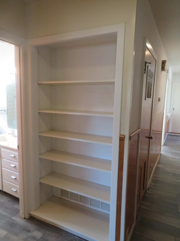 3405 37th Street Lubbock, TX 79413 - Photo 12 of 24 a view of walk in closet with empty racks