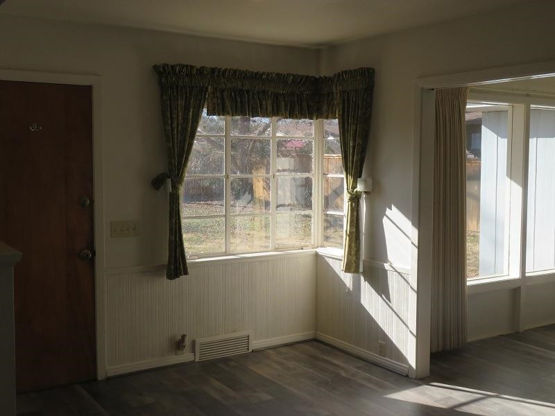 3405 37th Street Lubbock, TX 79413 - Photo 5 of 24 a view of an empty room with a window