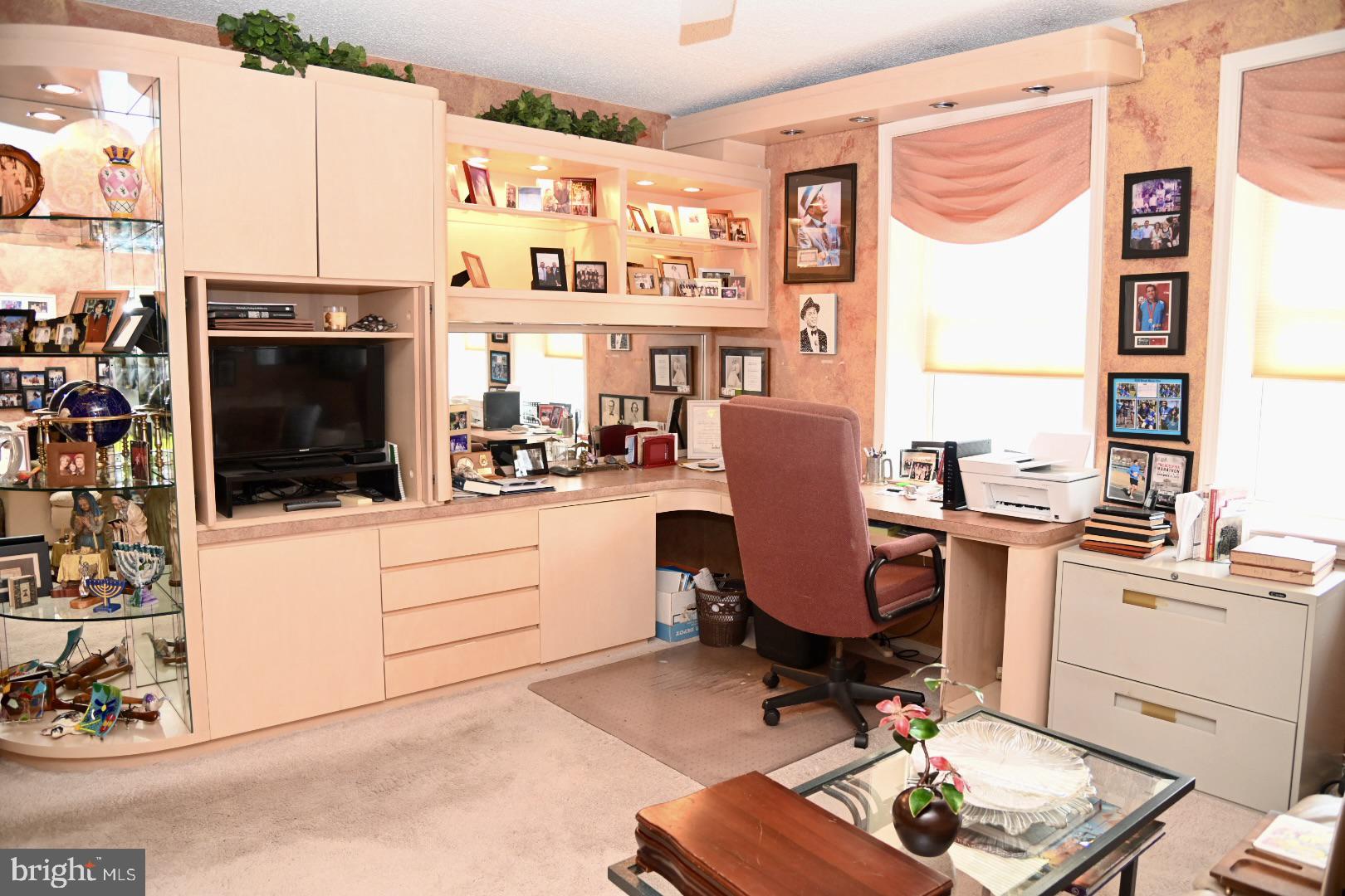 5303 Centennial Station Warminster, PA 18974 - Photo 23 of 60 a room with furniture a rug and a fireplace