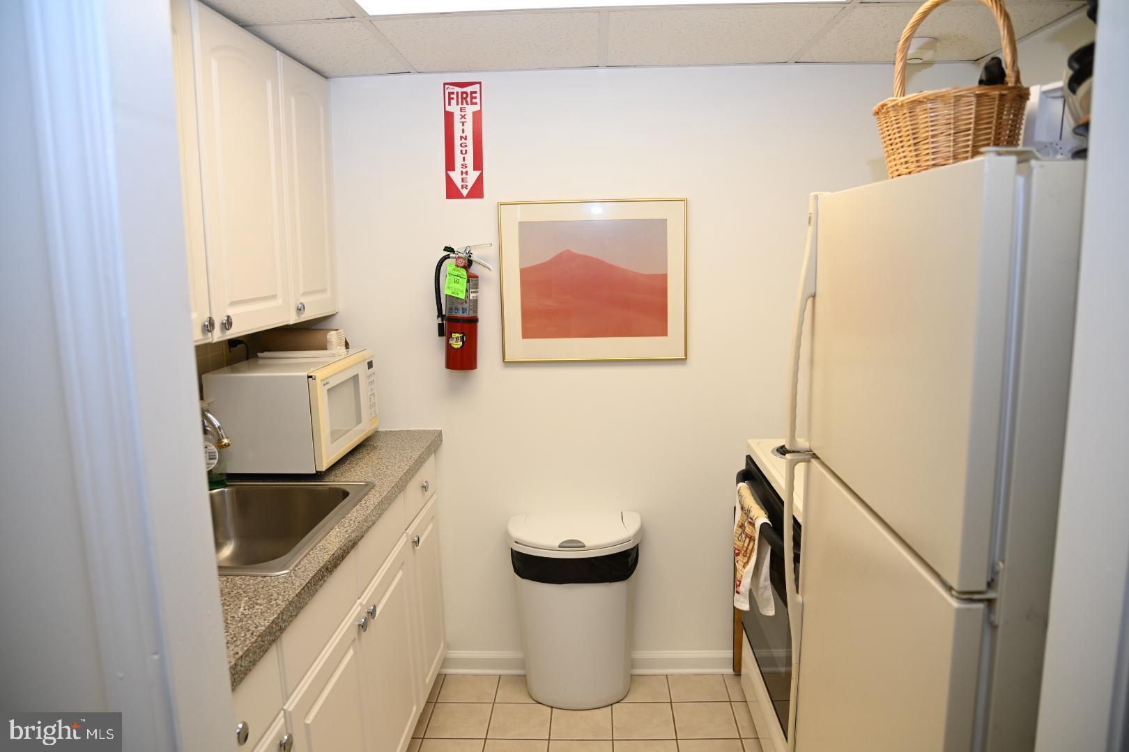 5303 Centennial Station Warminster, PA 18974 - Photo 28 of 60 a bathroom with a granite countertop toilet sink and mirror