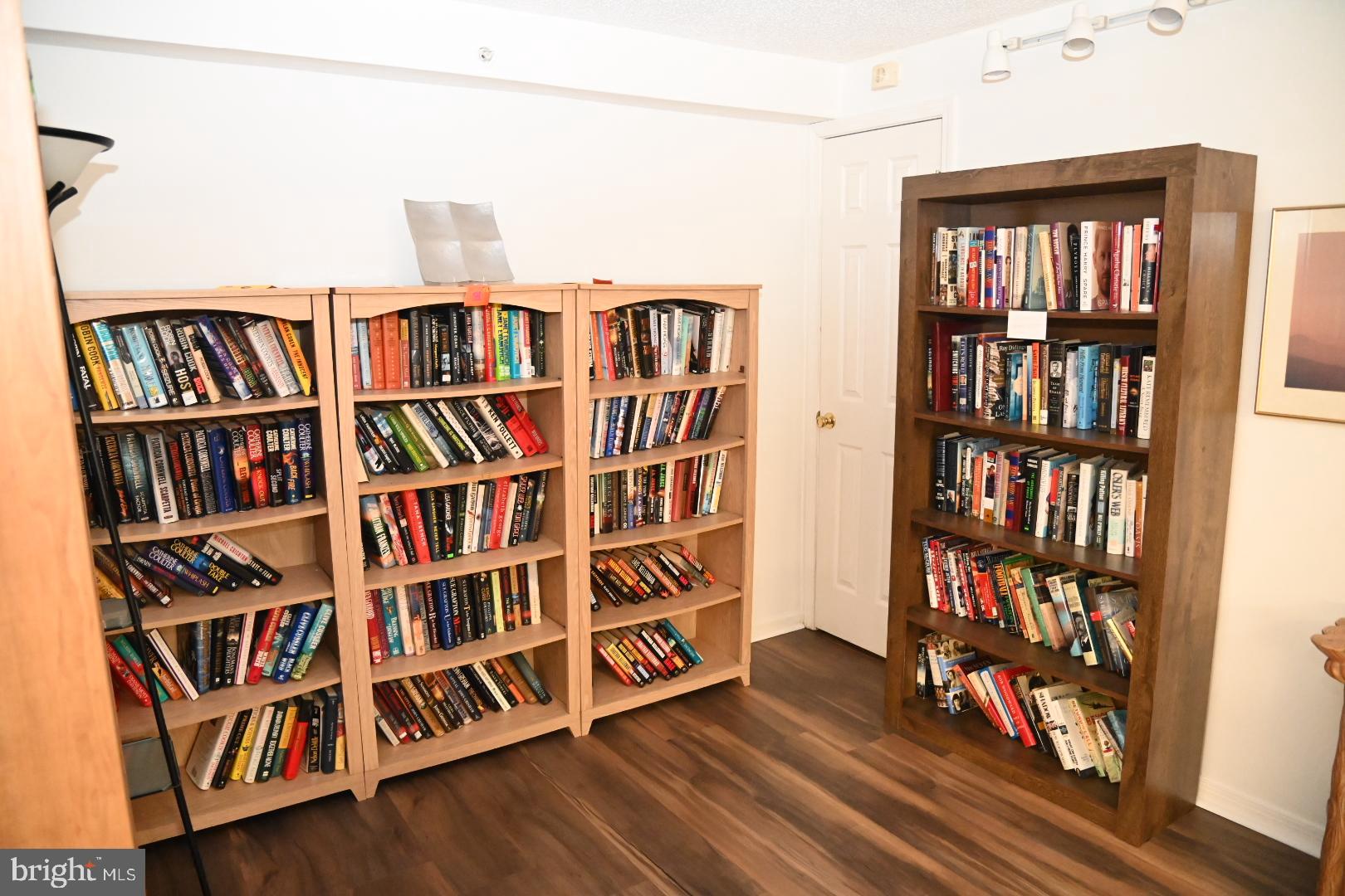 5303 Centennial Station Warminster, PA 18974 - Photo 29 of 60 a living room with book shelf and a book shelf
