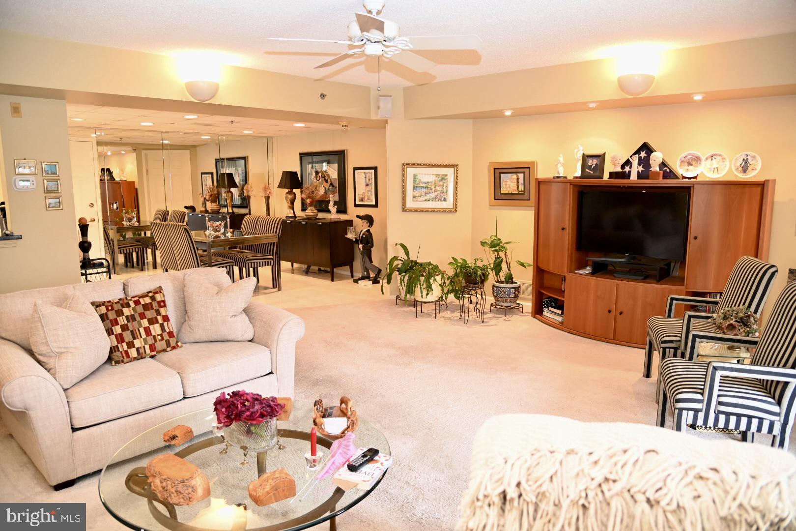 5303 Centennial Station Warminster, PA 18974 - Photo 3 of 60 a living room with furniture and a flat screen tv