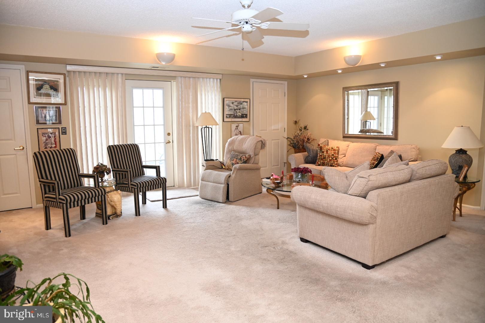 5303 Centennial Station Warminster, PA 18974 - Photo 4 of 60 a living room with furniture and a large window