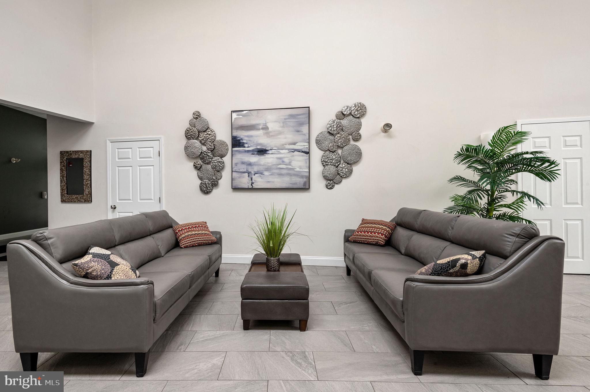 5303 Centennial Station Warminster, PA 18974 - Photo 44 of 60 a living room with furniture and a couch