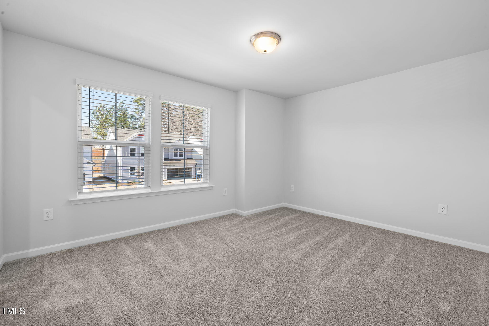 712 Ben Ledi Court Raleigh, NC 27603 - Photo 17 of 21 a view of an empty room with a window