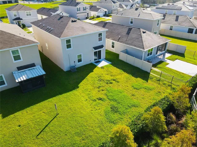 a view of a house with a big yard