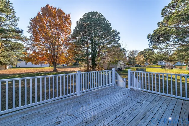 a view of a wooden roof deck