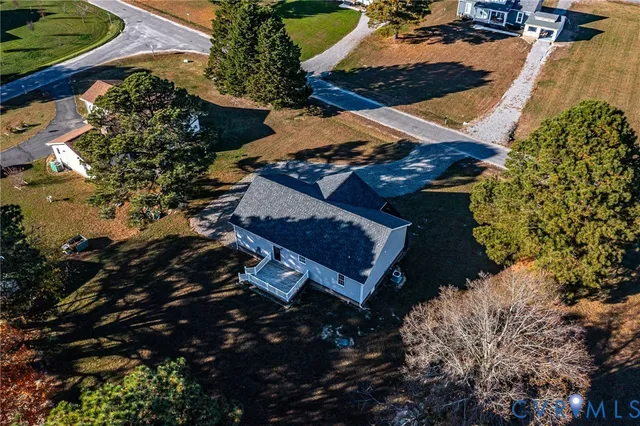 a view of a backyard of the house