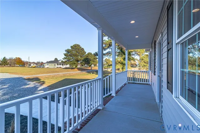a view of a balcony with ocean view