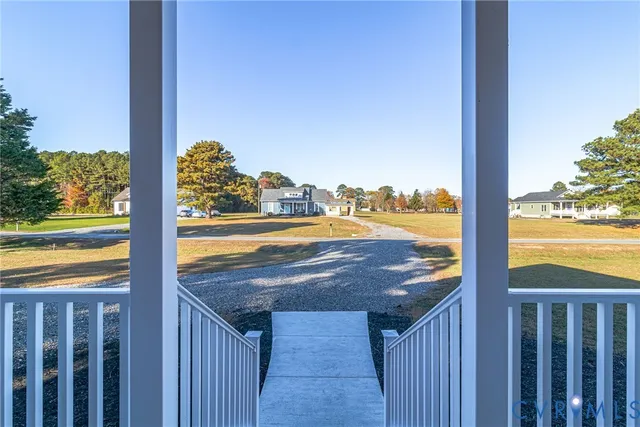 a view of a balcony next to a beach