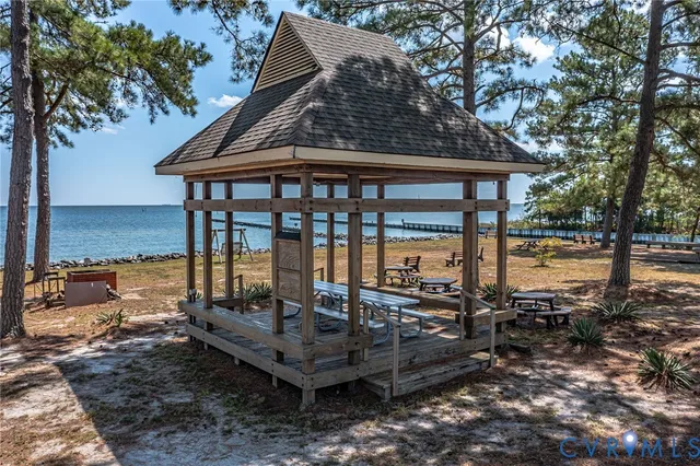 an outdoor view of the patio and swimming pool