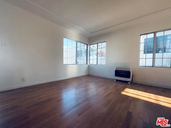 an empty room with windows