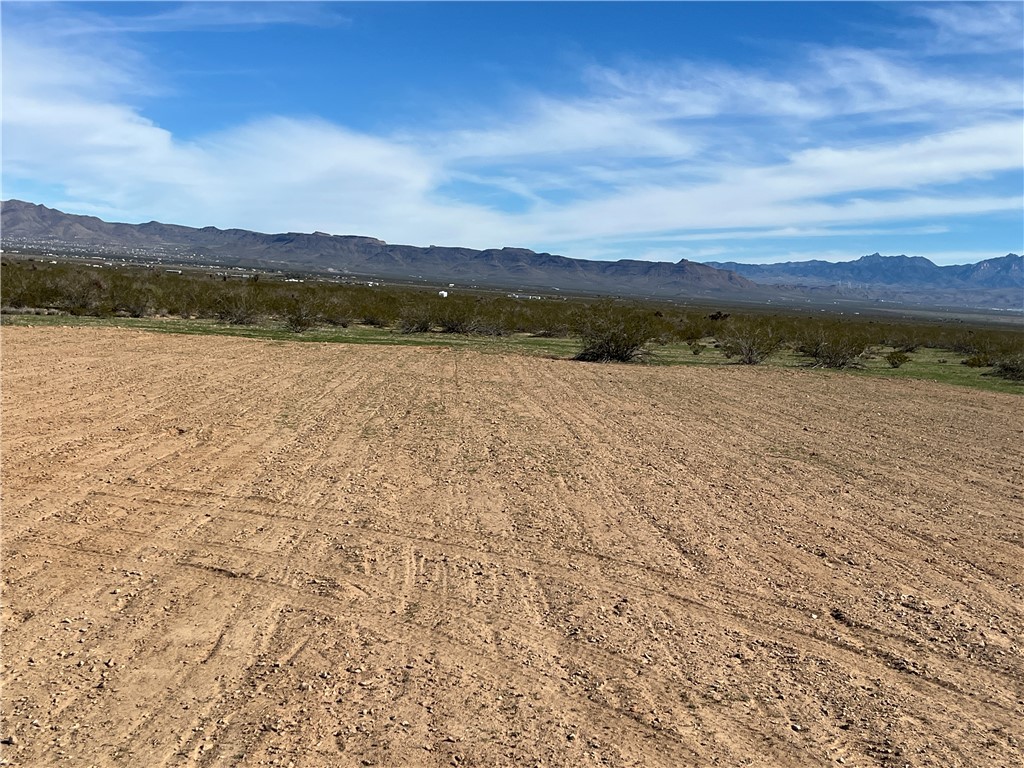 2034 South Cordes Road Golden Valley, AZ 86413 - Photo 8 of 17 View Looking to the South from Near Center of Cleared Pad at 2034 S Cordes Rd with Hualapai Mtns in the Background