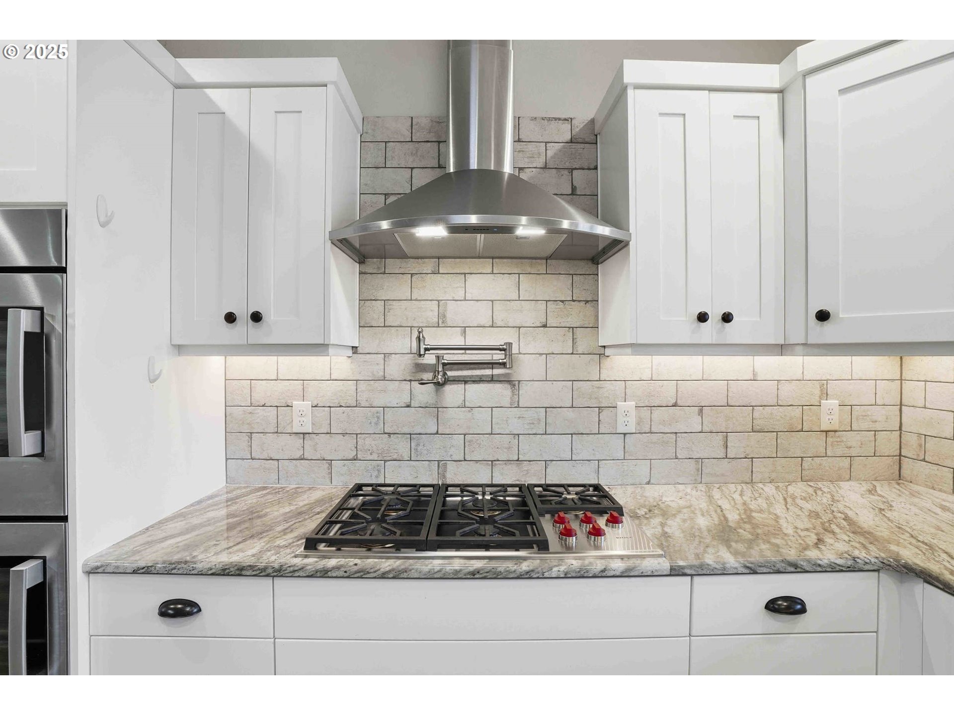 112 Summit View Avenue Southeast Salem, OR 97306 - Photo 11 of 47 a kitchen with a stove and cabinets